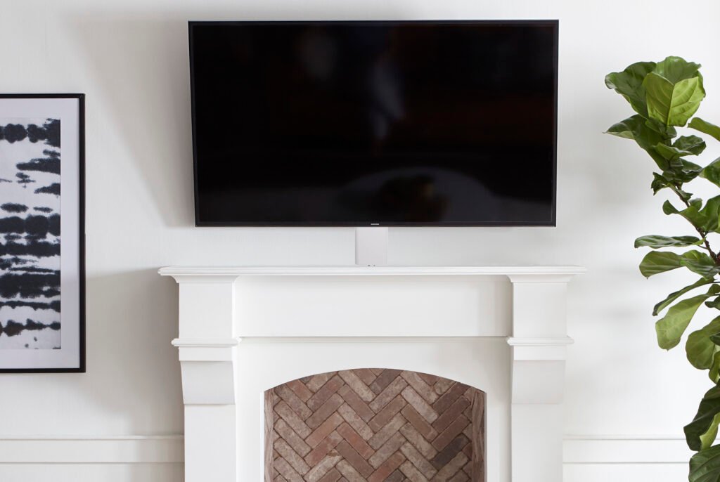 pull down tv mount above fireplace
