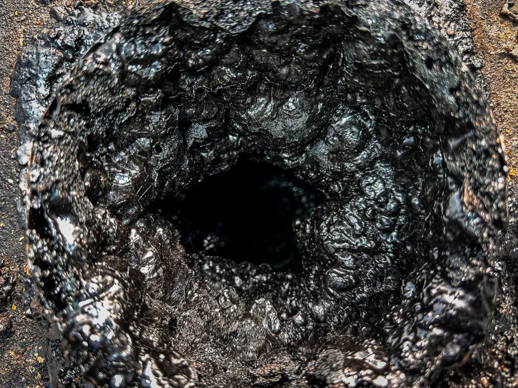Creosote buildup stages inside a chimney flue